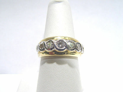 DIAMOND 7 ROUND BRILLIANT SHAPE BEZEL SET DIAMOND BAND