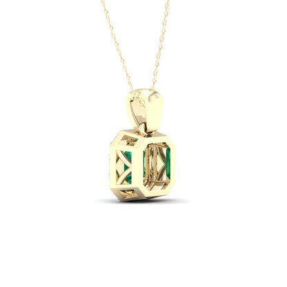 Imperial Gemstone 10K Yellow Gold Emerald Cut Emerald 1/10 CT TW Diamond Halo Ne