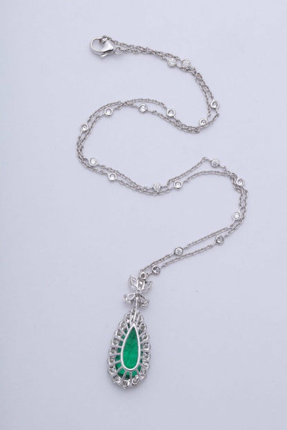 Emerald and diamond pendant. 5.23 carat green emerald lariette diamond necklace
