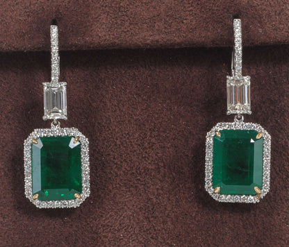 EMERALD 2 EMERALD SHAPE DIAMOND EMERALD SHAPE AND ROUND DROP HALO
