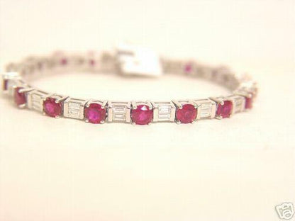 18 ROUND SHAPE RUBIES 11.10 CT AND 36 BAGUETTE SHAPE DIAMOND 3.42 CT 18 K WHITE