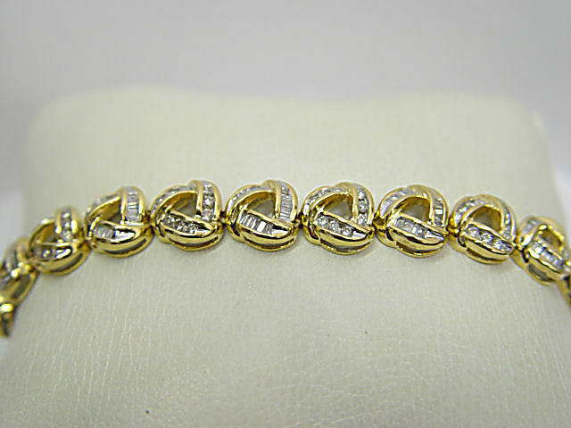 DIAMOND ROUND BRILLIANT BAGUETTE SHAPE CHANNEL SET DIAMOND