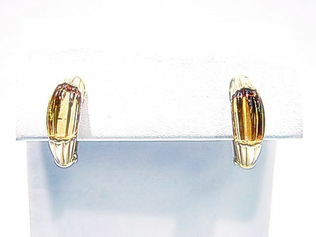 2 CITRINE SHAPE FLUTED SHAPE SET IN YELLOW GOLD HUGGY