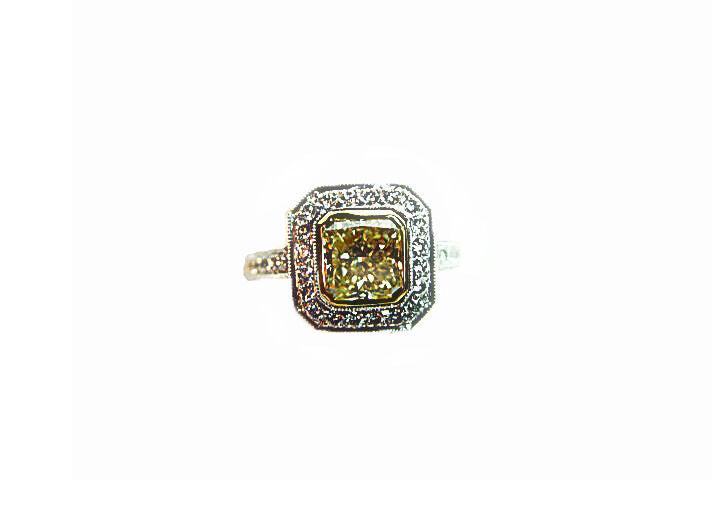 GIA CERTIFIED FANCY YELLOW COLOR GRADE SI1 CLARITY RADIANT 2.52 CT PLATINUM