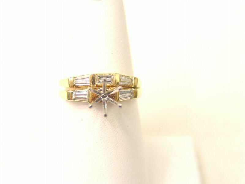 .58 CT Diamond straight and tappered ring