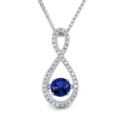 Dancing Lab Created Blue Sapphire and 0.12 CT. T.W. Diamond Infinity Pendant in