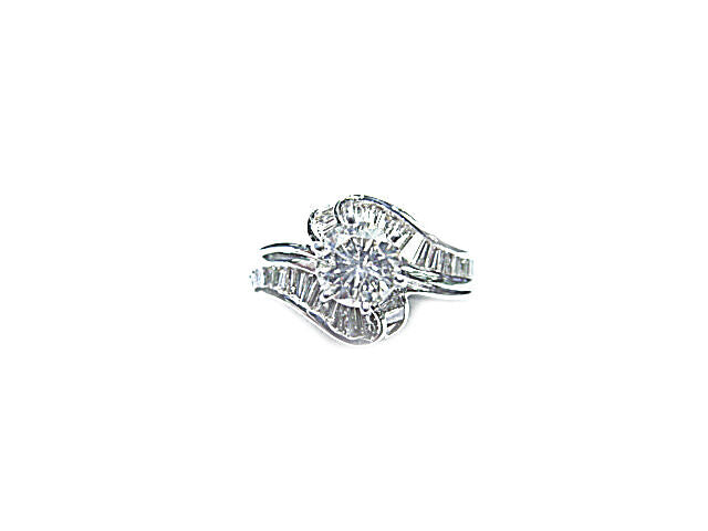 ROUND BRILLIANT SHAPE BAGUETTE SHAPE DIAMOND RING