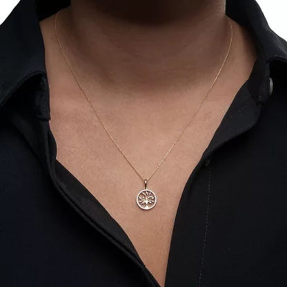0.12 CT. T.W. Diamond Tree of Life Pendant in 14K Yellow Gold (I, I1)