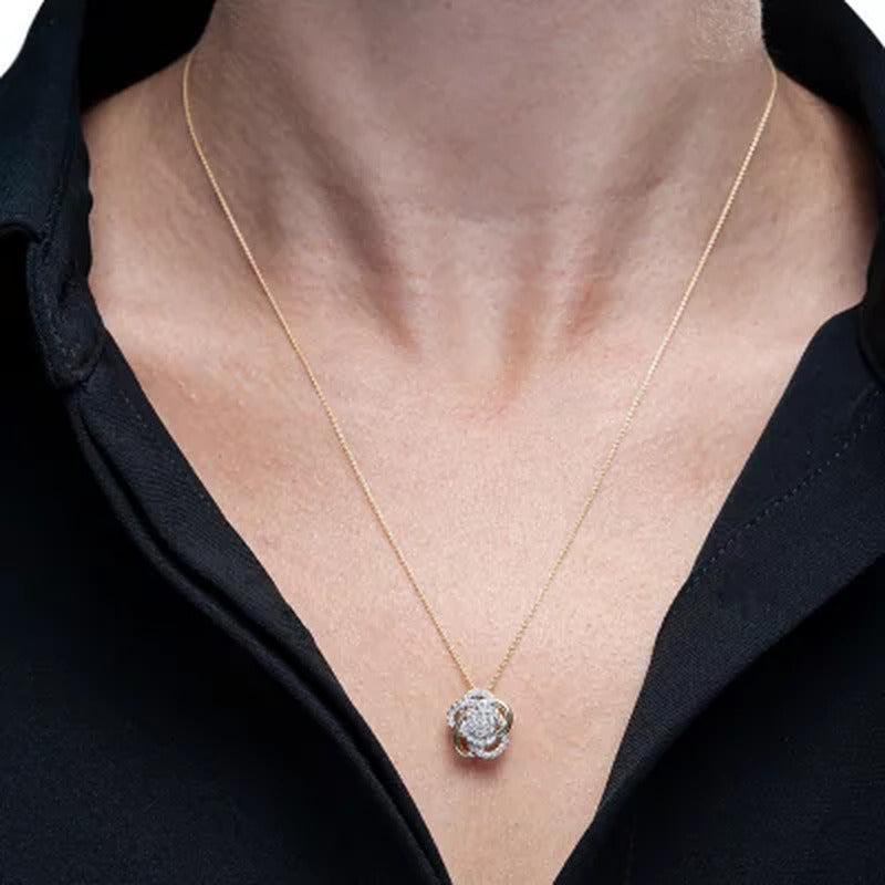 0.25 CT. T.W. Diamond Love Knot Pendant in 14K Yellow Gold