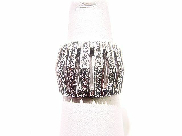 DIAMONDS SET ON TOP BAND IN 7 ROWS