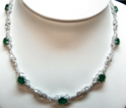 EMERALD 7 OVAL SHAPE DIAMOND ROUND BRILLIANT AND TAPERED DIAMOND