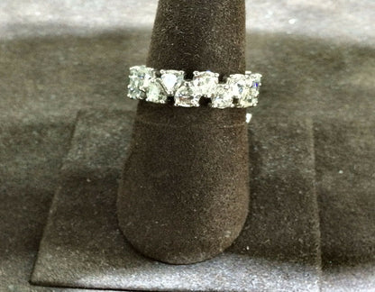 DIAMOND PEAR SHAPE SET ALTERNATING UP AND DOWN STYLE ALL THE WAY AROUND 18 K