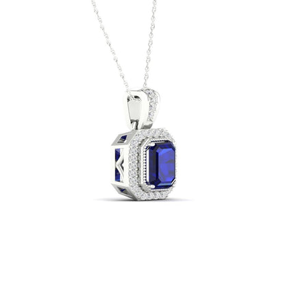 Imperial Gemstone 10K White Gold Emerald Cut Blue Sapphire 1/10 CT TW Diamond Ha