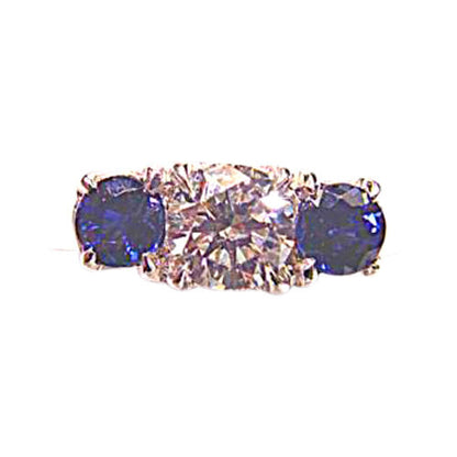 .80 CT 2 SAPPHIRE SHAPE SIDE STONE 1 ROUND BRILLIANT SH .61 CT DIAMOND 18 K GOLD