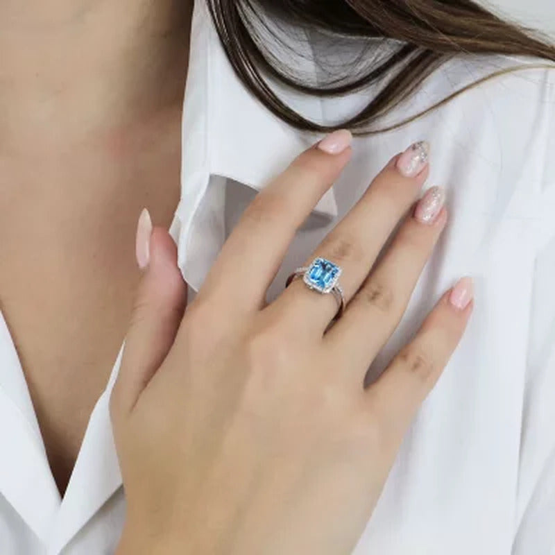 Blue Topaz and 0.14 CT. T.W. Diamond Ring in Sterling Silver