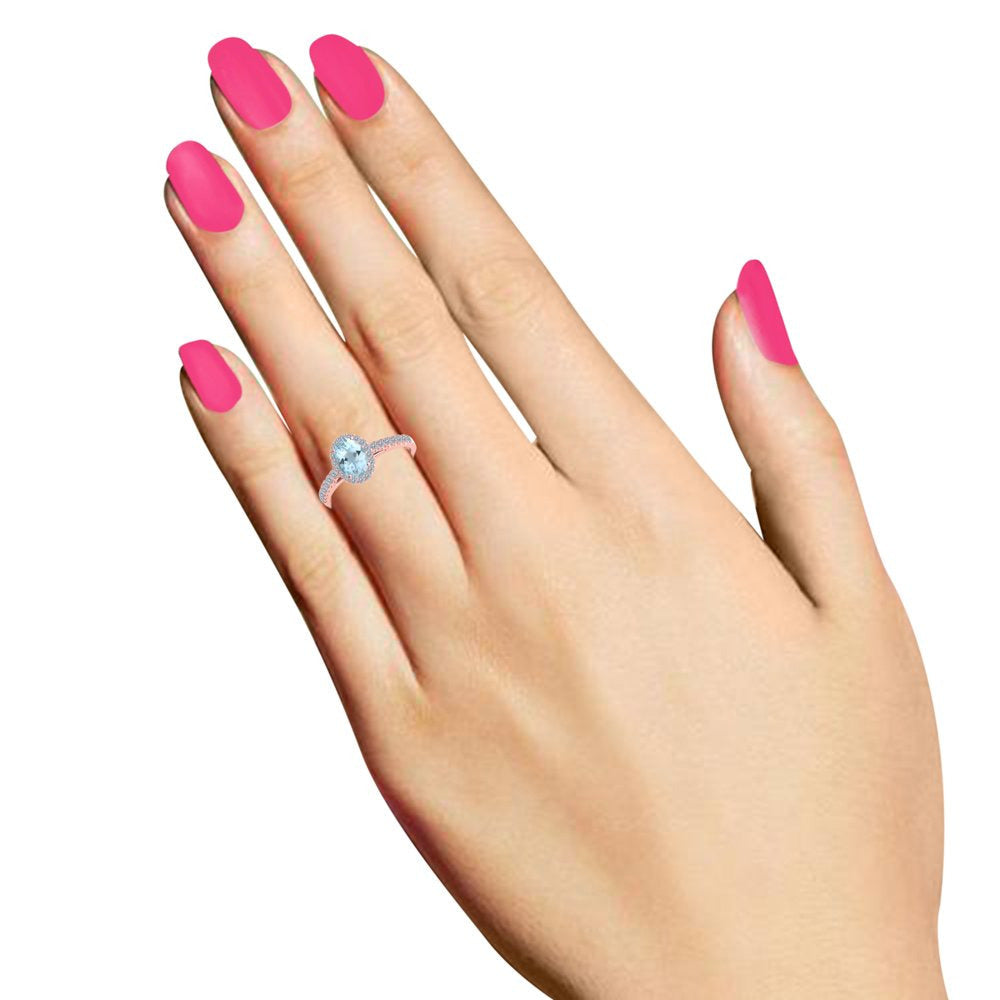 1.75 Ct. Ttw Diamond and Oval Shaped Aqumarine Ring in 10K Rose Gold