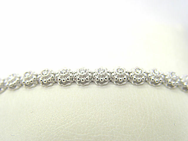 DIAMOND ROUND BRILLIANT SHAPE 31 STONE SET BEZEL SET DIAMOND