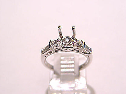 DIAMOND 2 ROUND BR 2 BAGUETTE SHAPE SETTING 4 PRONG DIAMOND SETTING DIAMOND RING