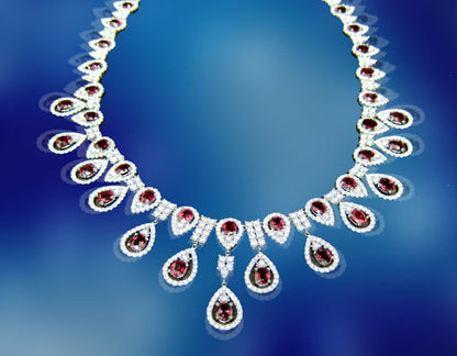 DIAMOND ROUND BRILLIANT SHAPE RUBY OVAL SHAPE DIAMOND NECKLACE