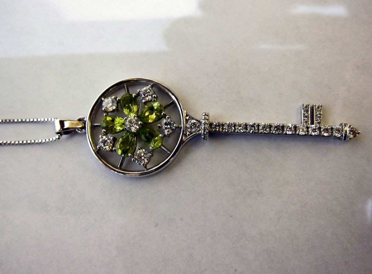 PERIDOT PEAR SHAPE AND DIAMOND ROUND BRILLIANT KEY PENDANT