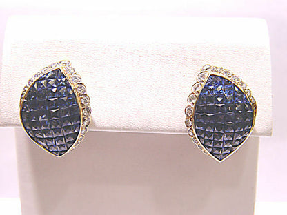 FRENCH CUT BLUE SAPPHIRES INVISIBLE SET WITH ROUND BRILLIANT DIAMOND