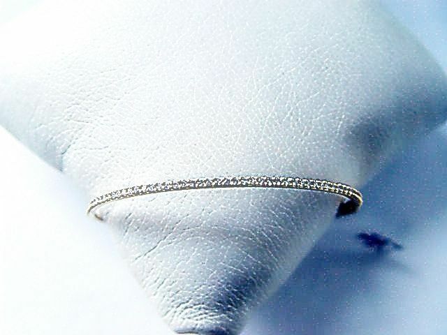 .66 CT DIAMOND SET ON TOP BANGLE ROUND 18 K YELLOW GOLD