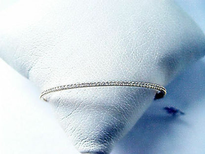 .66 CT DIAMOND SET ON TOP BANGLE ROUND 18 K YELLOW GOLD