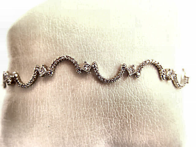 2.48 CT 11 PRINCESS SHAPE DIAMOND SET ROUND BRILLIANT SH DIAMOND SWIRL BRACELET