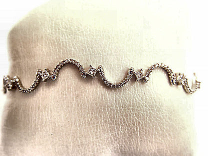 2.48 CT 11 PRINCESS SHAPE DIAMOND SET ROUND BRILLIANT SH DIAMOND SWIRL BRACELET