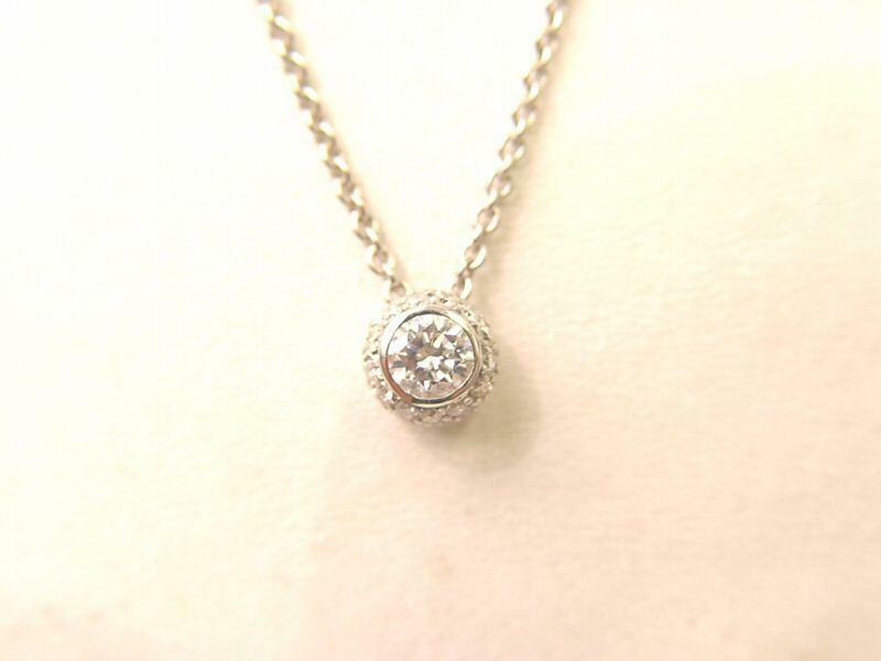 ROUND BRILLIANT CUT DIAMOND PENDANT .41 CT CENTER .33 CT
