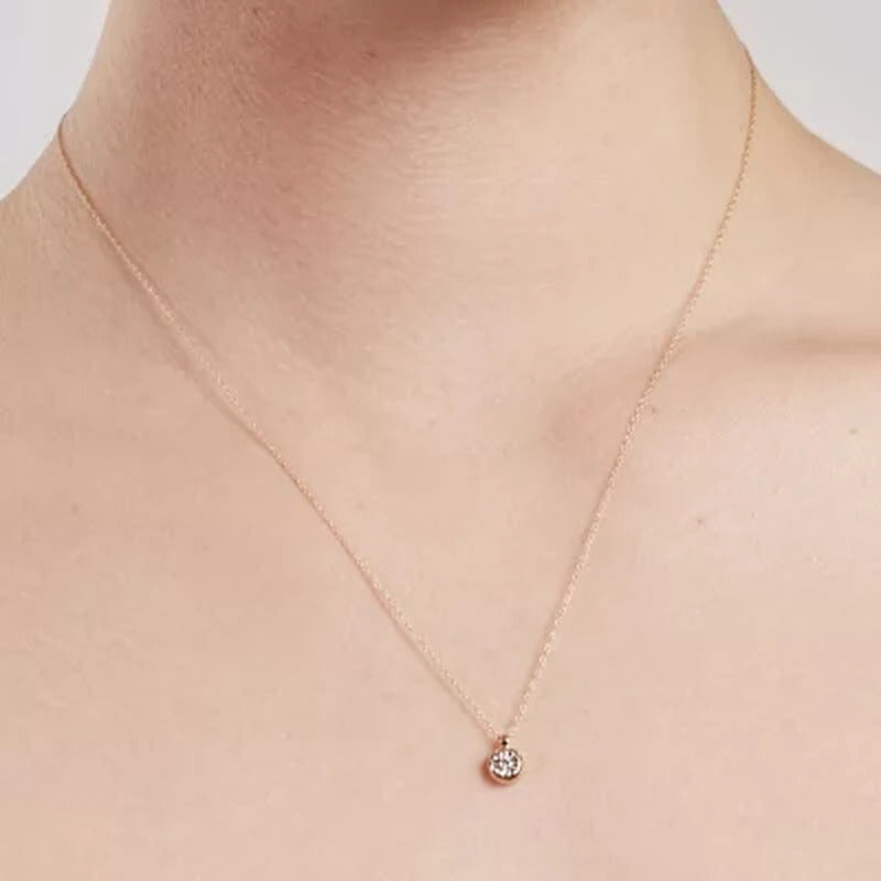 0.04 CT. T.W. round Diamond Pendant in 14K Two-Tone Gold