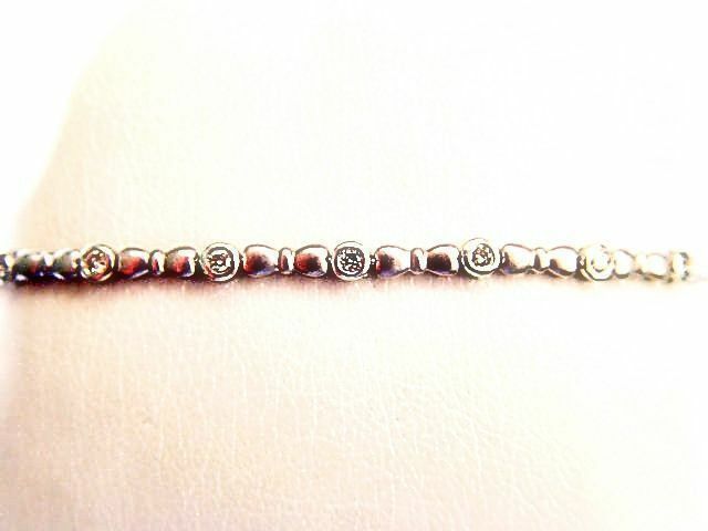 16 ROUND BRILLIANT CUT DIAMONDS BEZEL SET IN BRUSHED