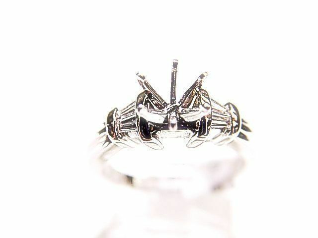 DIAMOND 4 TAPERED BAGUETTE SHAPE SETTING 6 PRONG