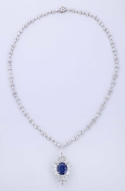 Emerald and diamond pendant. 5.23 carat green emerald lariette diamond necklace
