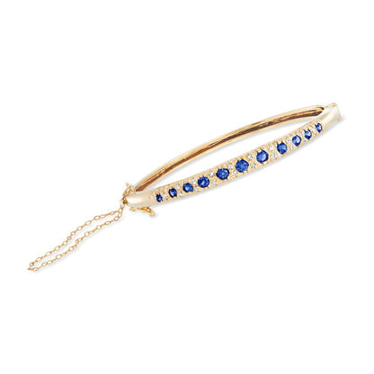 C. 1980 Vintage 1.50 Ct. T.W. Sapphire and .25 Ct. T.W. Diamond Bangle Bracelet