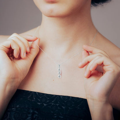 1 Carat TW Three Stone Diamond Pendant Available in 14K Yellow and White Gold