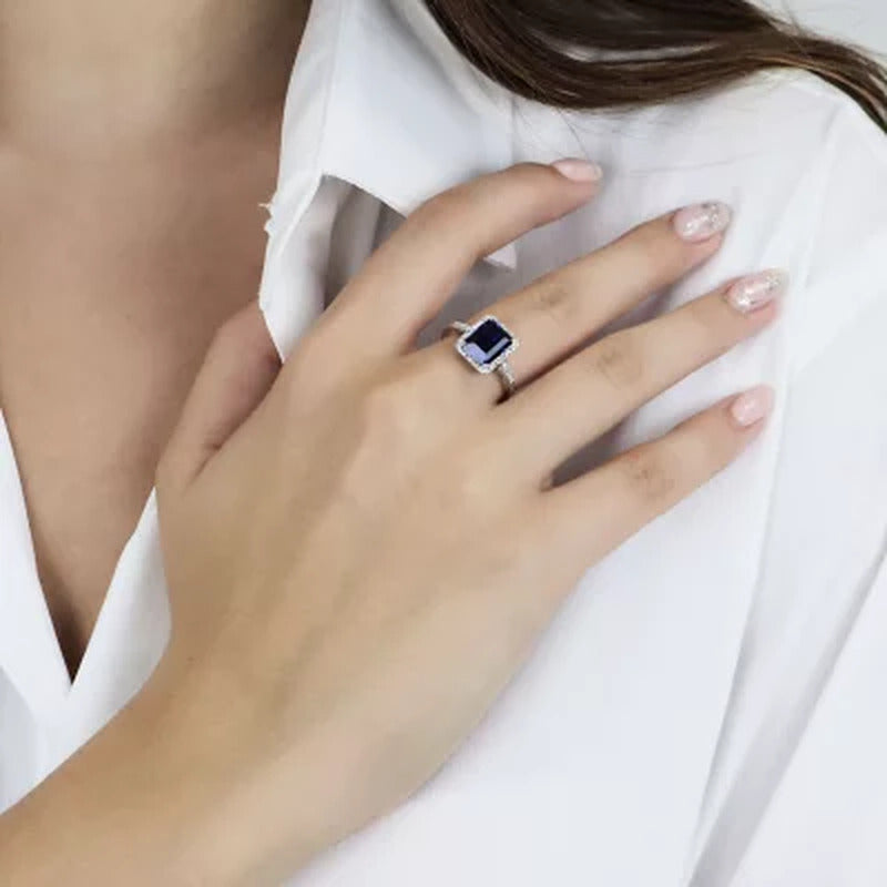 Lab Created Blue Sapphire and 0.14 CT. T.W. Diamond Ring in Sterling Silver