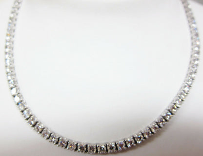 DIAMOND TENNIS NECKLACE 20 POINTERS SAME SIZE DIAMOND SET TO THE BACK