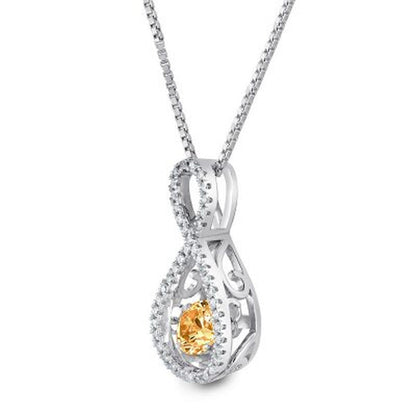 Dancing Genuine Citrine and 0.12 CT. T.W. Diamond Infinity Pendant in Sterling S