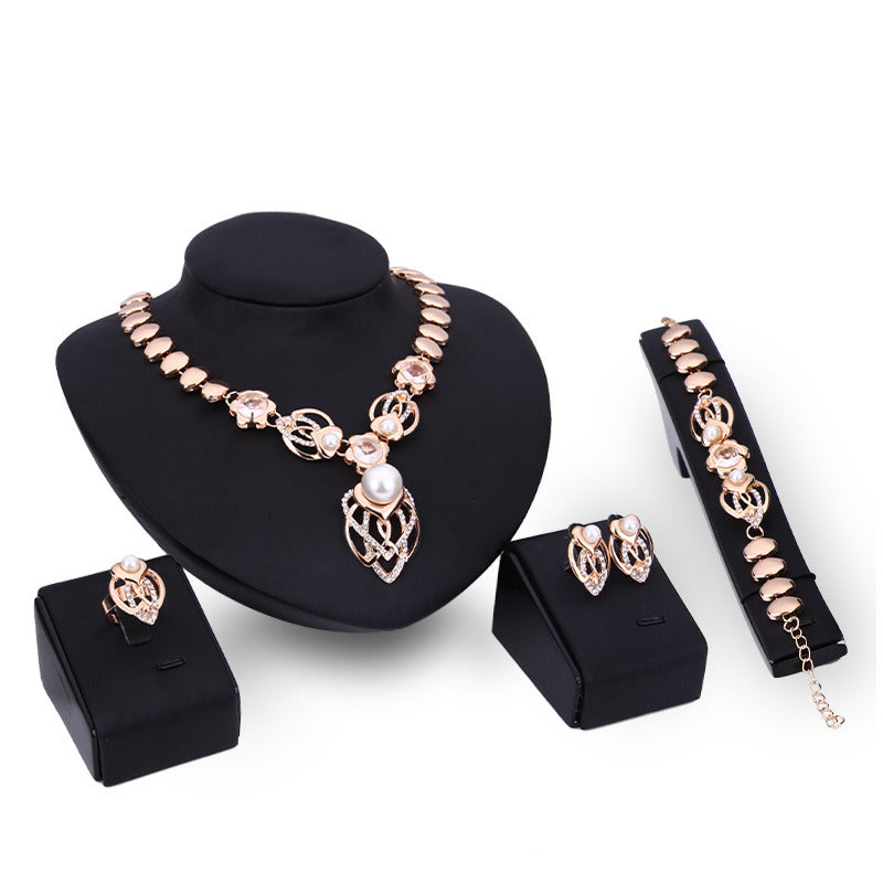 Pearl and Diamond Four-Piece Necklace and Earrings