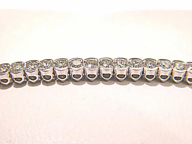 61 ROUND BRILLIANT CUT DIAMONDS HALF BEZEL SET DIAMOND