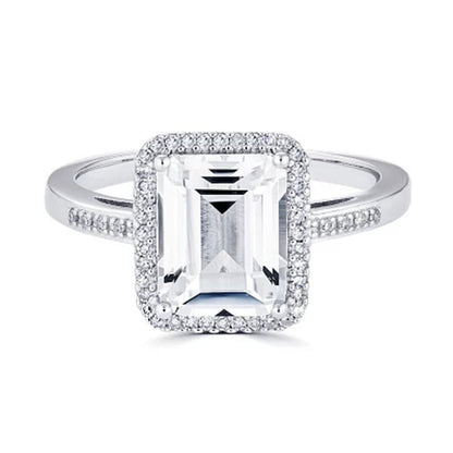 Lab Created White Sapphire and 0.14 CT. T.W. Diamond Ring in Sterling Silver
