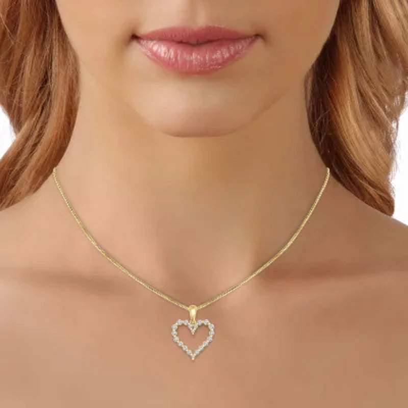 0.23 CT. T.W. Diamond Heart Pendant in 14K Gold