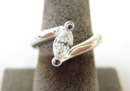 CERTIFIED HEAVY PLATINUM RING CENTER MARQUISE BRILLIANT .75 CT PLATINUM
