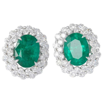 3.08 carats of fine green oval emeralds 2.05 carats of round brilliant cut dimd