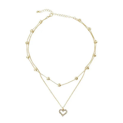 Trendy High-End Gold Double Heart Necklace with Diamonds