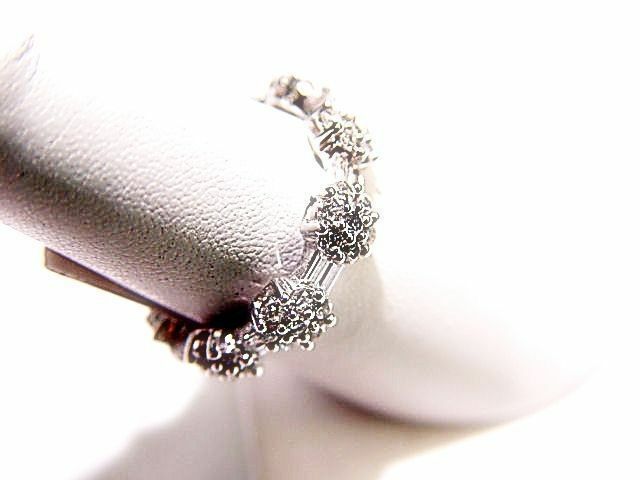 DIAMOND SET ALL THE WAY AROUND THE BAND ALTERNATING