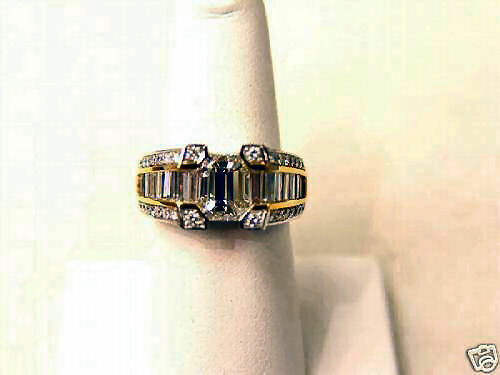 LABORATORY CERTIFIED EMERALD CUT CENTER DIAMOND 2.03 C
