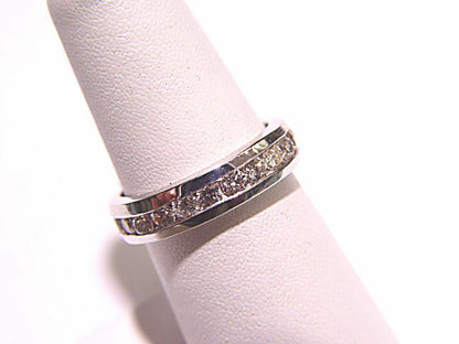 DIAMOND SET ALL THE WAY AROUND THE BAND ETERNITY CHANNEL SET