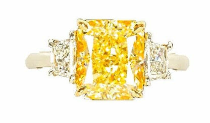 GIA FANCY LIGHT YELLOW 4.01 CT RADIANT VVS1 CLARITY GRADE .58 CT SIDE TRAPEZOID